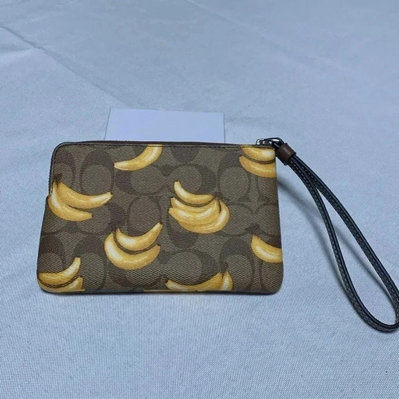 COACH Wristlet, Banana Print. NWT. - Picture 2 of 3